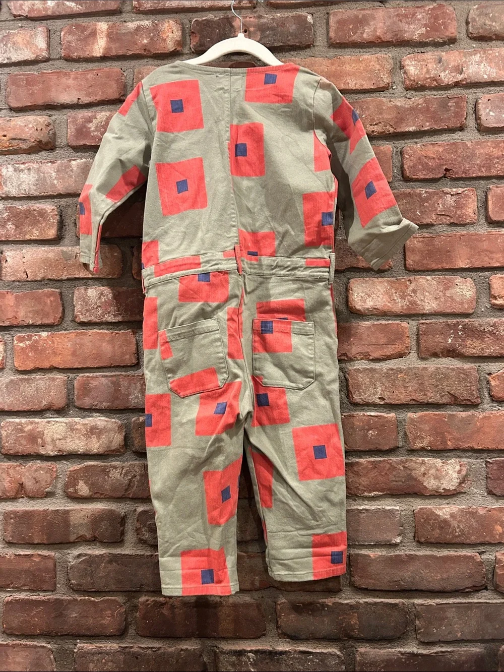 Bobo Choses Olive Green Jumpsuit with Coral & Navy Geometric Print
